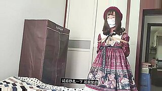 Sweet Chinese girl explores BDSM with self-binding and restraints.
