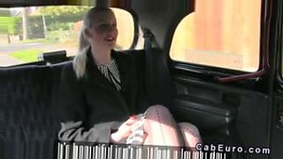 Tall blonde gets oral and penetrative sex in taxi.